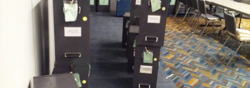 Ballot boxes were brought into a room at COBO Hall in preparation for the Detroit Proposal R recount.